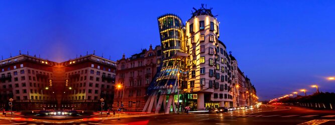 Trip Moldawien Reisetipps - Das tanzende Haus ist ein Bürogebäudes in der tschechischen Hauptstadt Prag. Beliebte Aussichtsplattform mit schöner Architektur in Prag. Das „Tanzende Haus“ in Prag, das charismatische Bürogebäude mit dem Namen Ginger & Fred in Tschechien bezaubert mit mutiger Architektur. Geschwungen, dynamisch, strahlt es eine charmante Ungezwungenheit und Fröhlichkeit aus. Oben in der Glas-Bar genießt man den herrlichen Rundblick. Wie eine Tänzerin im Kleid, die sich an einen Herrn mit Hut schmiegt: Und doch ist es ein Haus. Das Tanzhaus ist eines der neuen Denkmäler der Stadt.